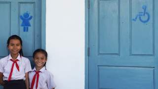 Girls outside disability-accessible school toilet