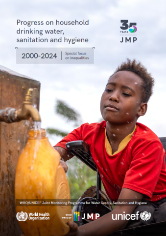 A boy carries water in a jerrican on his wheelchair to his home, Uganda. © UNICEF/UNI687572/Miriam Watse